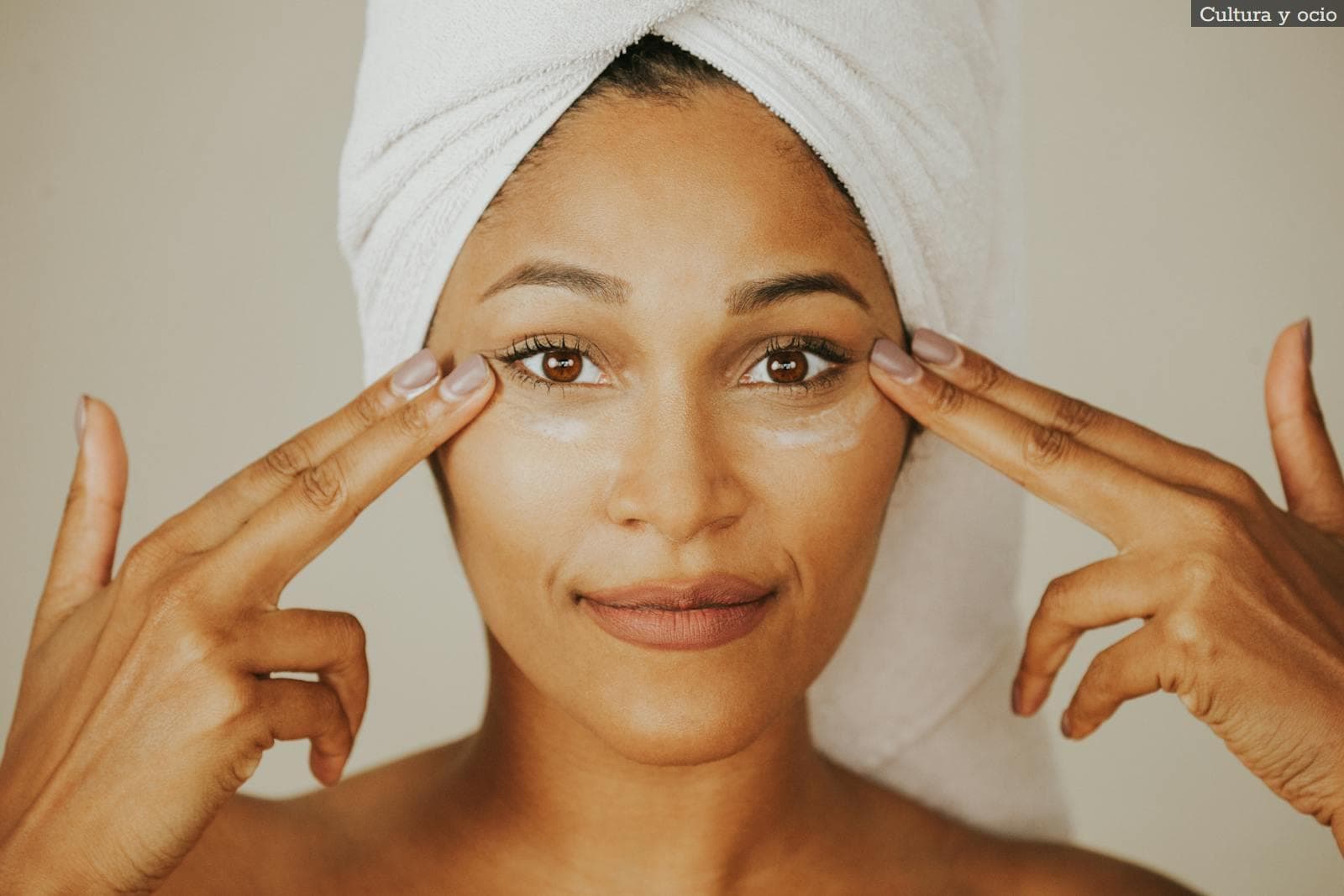A Woman Applying a Facial Cream