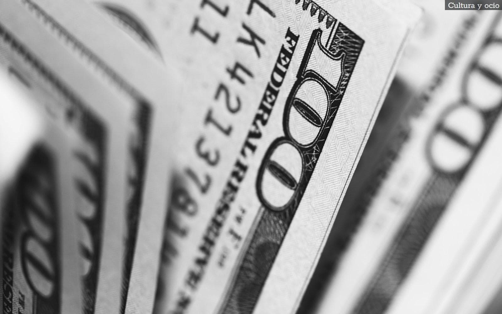 closeup photo of 100 US dollar banknotes